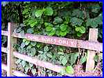 Sign on Fence